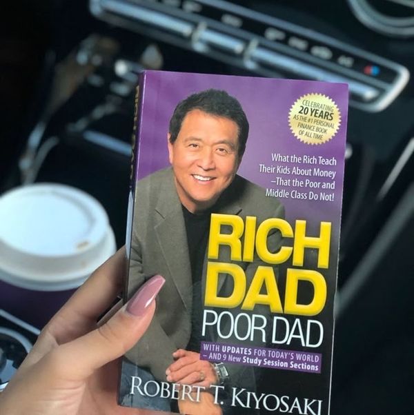 Rich Dad Poor Dad by Robert Kiyosaki & Sharon Lechter