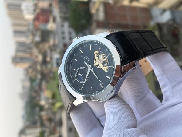 TISSOT AUTOMATIC SILVER CASE BLACK DIAL