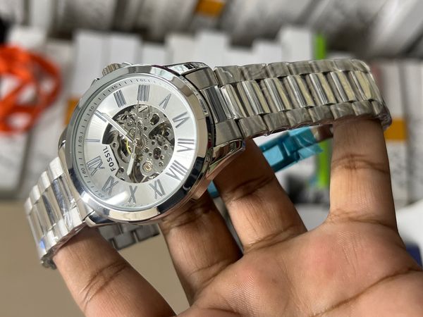 FOSSIL AUTO CHAIN WHITE DIAL