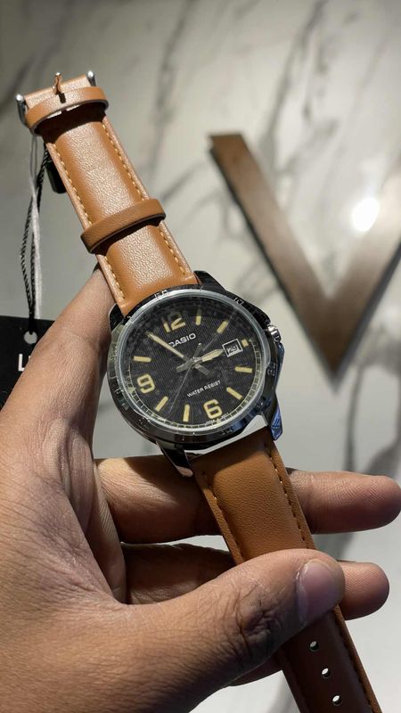 Casio MTP-V004L-1B2 Men’s Yellow Leather Watch with White Dial