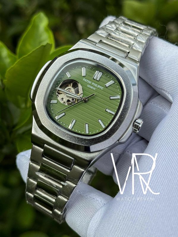PATEK AUTO OPEN HEART GREEN DIAL