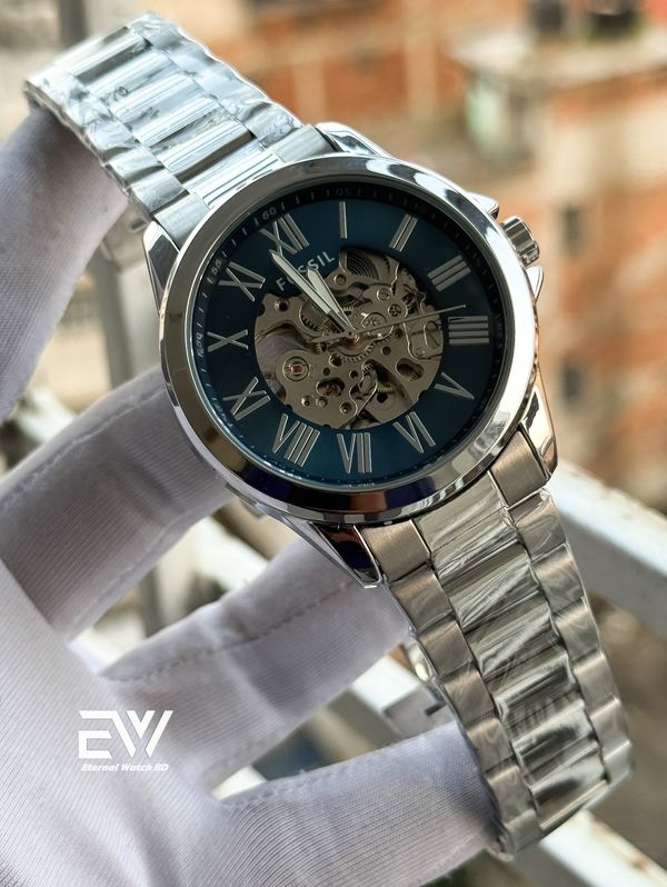 FOSSIL AUTOMATIC BLUE DIAL SILVER CASE