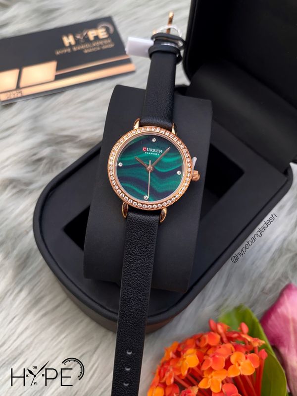 Curren ladies green dial