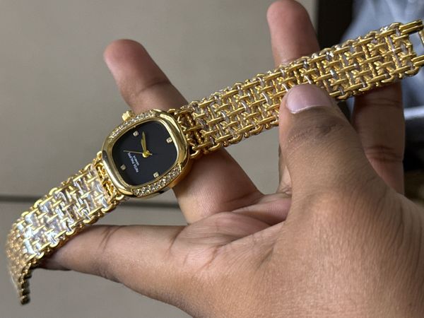 PATEK PHILIPPE STONE CASE GOLD BLACK DIAL