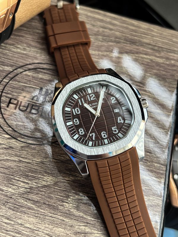 Patek Philippe Aquanaut Silver Bezel Brown Dial