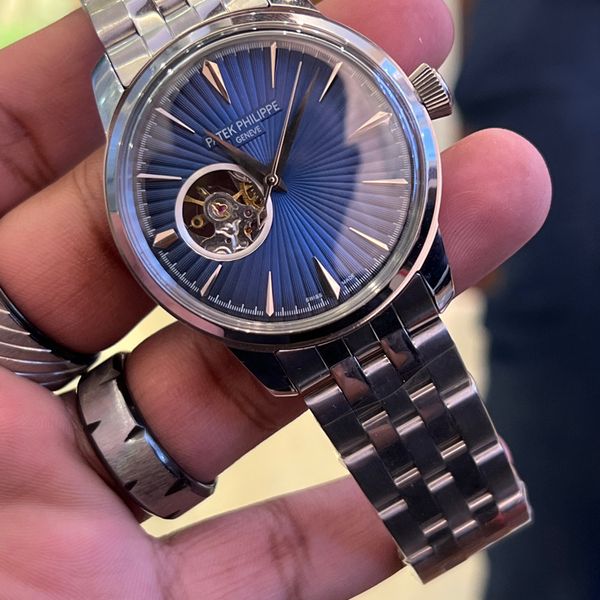 PATEK AUTO CH BLU DIAL OPEN HEART