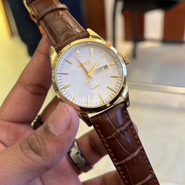 SKMEI 9073 BROWN BELT GOLD CASE WHITE DIAL
